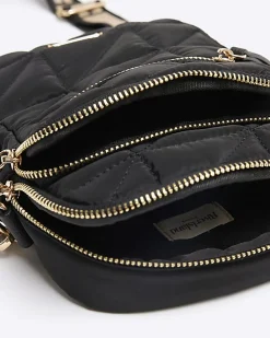 Black quilted zip pocket cross body bag