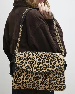 Brown Hair on Leopard Print Shoulder Bag