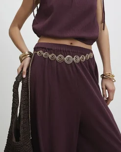 Gold swirl chain belt